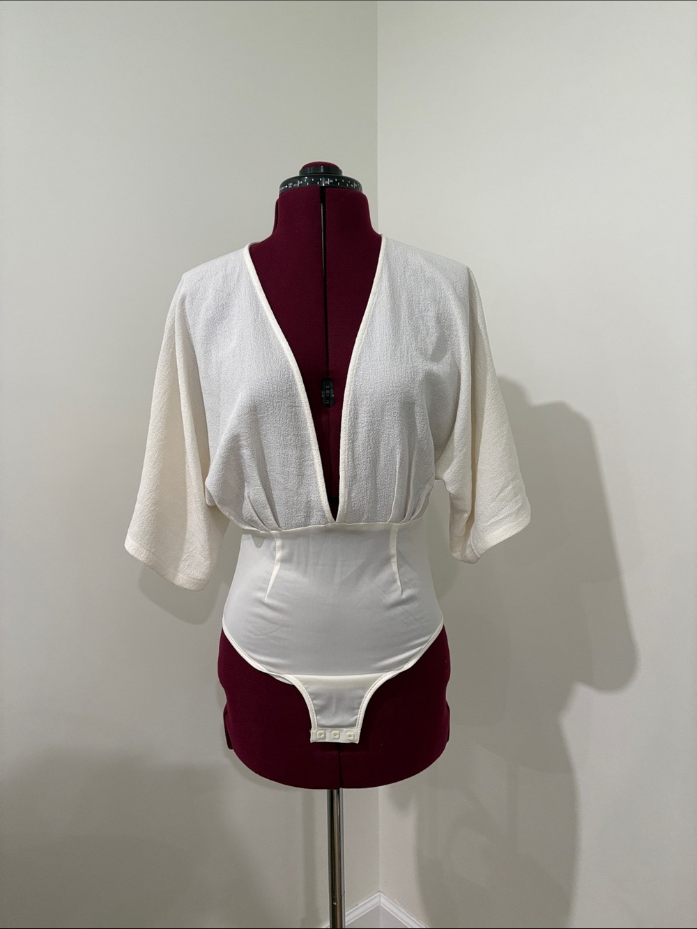 Lulu's Ivory Deep V-Neck Textured Bodysuit